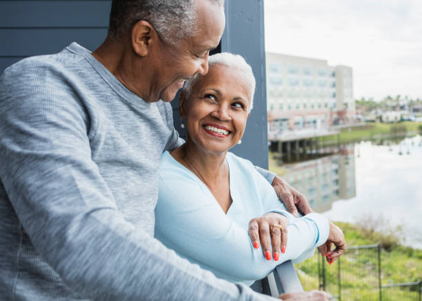 Affectionate senior couple on balcony