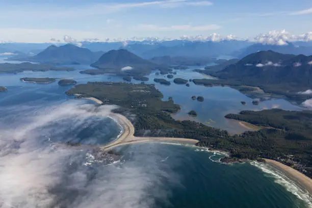 Aerial view of beautiful Beach on the Pacific Ocean Coast during a sunny summer morning. Taken in Tofino, Vancouver Island, British Columbia, Canada.