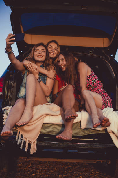 istock Four cheerful young women having a laugh while taking a selfie together 1172343499