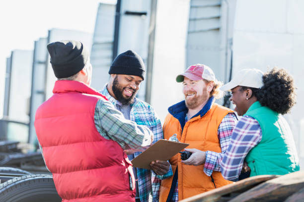 istock Workers at trucking company having meeting 1172345640