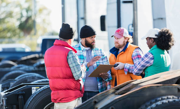 istock Workers at trucking company having meeting 1172345898