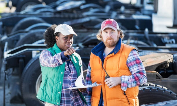 istock Workers at trucking company 1172345910