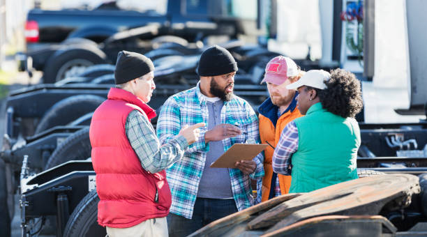 istock Workers at trucking company having meeting 1172346021