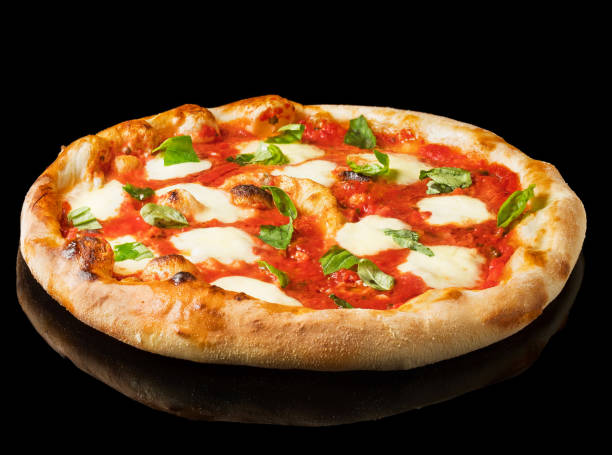 Pizza Margherita on black background. Pizza Margarita with Tomatoes, Basil and Mozzarella Cheese Pizza Margherita on black background. Pizza Margarita with Tomatoes, Basil and Mozzarella Cheese. pizza topping stock pictures, royalty-free photos & images