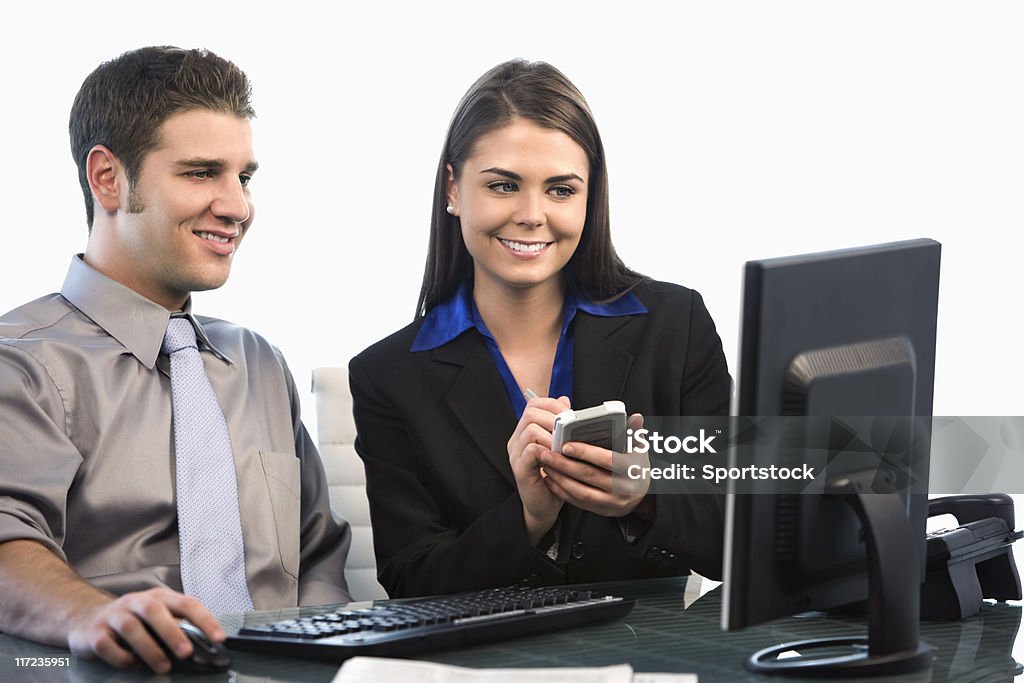 Бизнесмен и Деловая женщина на стол - Стоковые фото Бизнес роялти-фри