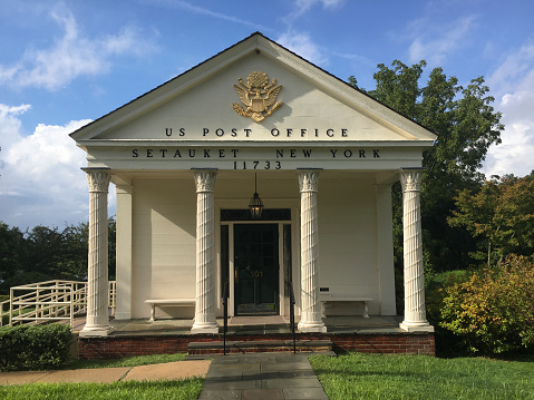 The front of the Setauket, NY United States Post Office building in the Town of Brookhaven in Long Island, New York.