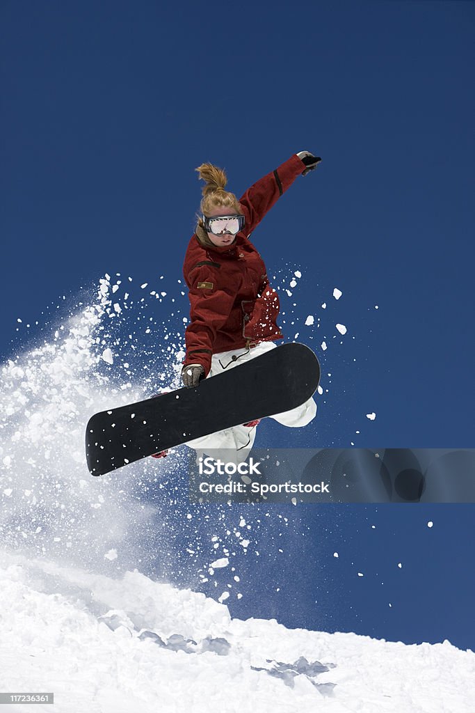 Jovem mulher em um Snowboard - Foto de stock de Adulto royalty-free