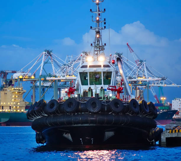 istock Tugboat with Large Tires at Dusk 1172369331