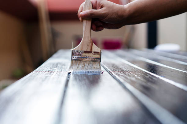 istock painting wooden table 1172372194