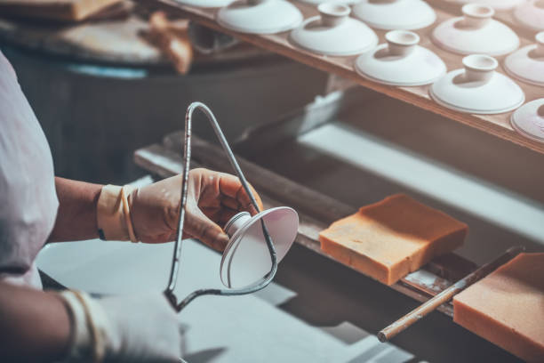 istock Glazing A Porcelain Cup in A Factory 1172374551