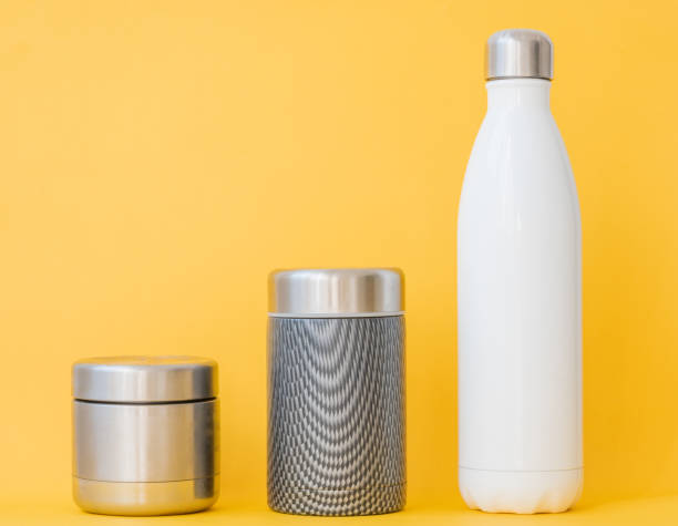istock Reusable bottle and containers against yellow background 1172387167