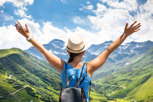 istock Woman Enjoying Panoramic Mountain View 1172394535