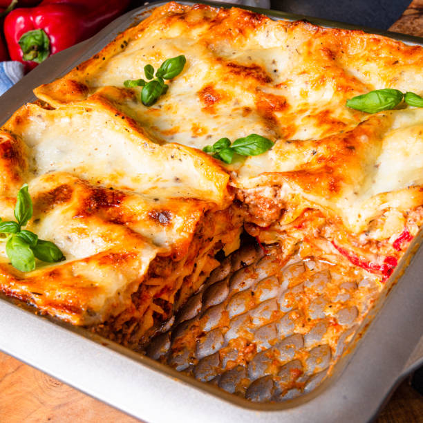 istock rustic spicy lasagne with basil on the tin. 1172395595