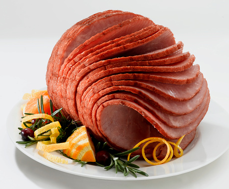 Sliced ham isolated on white background with clipping path.