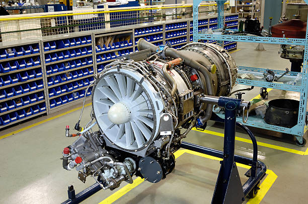 Gas turbine (jet) engine on stand for overhaul stock photo