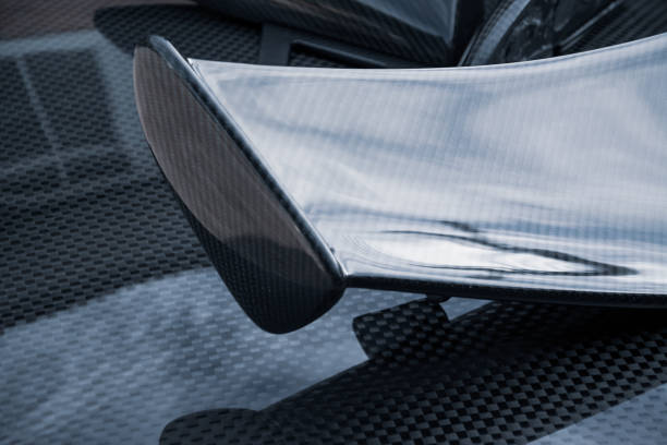 Carbon fiber composite product for motor sport and automotive racing Carbon fiber composite product for motor sport and automotive racing spoiler stock pictures, royalty-free photos & images