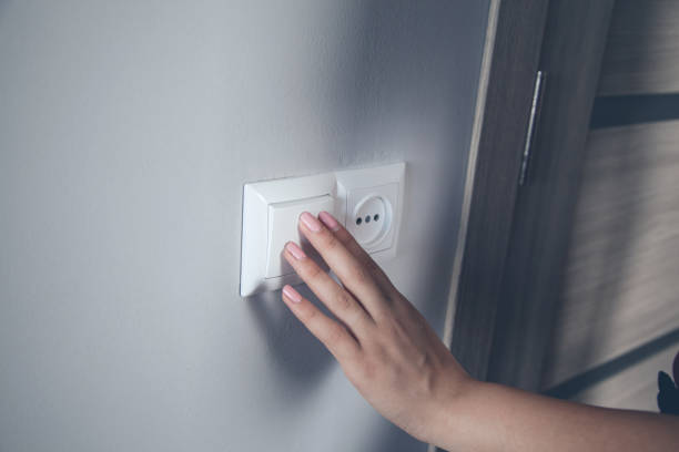 istock woman to turn on the light 1172403034