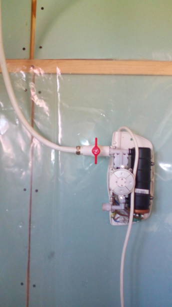 istock Wiring plumbing in a residential building 1172403477