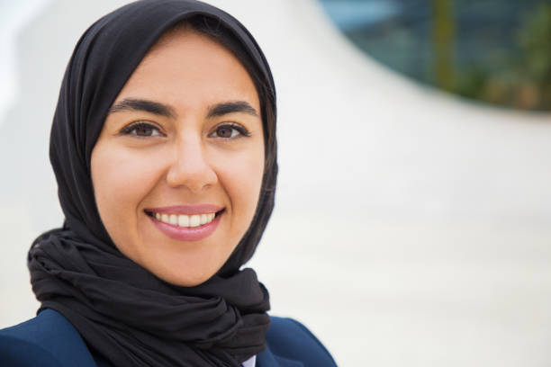 istock Happy confident Muslim business lady posing outside 1172403843