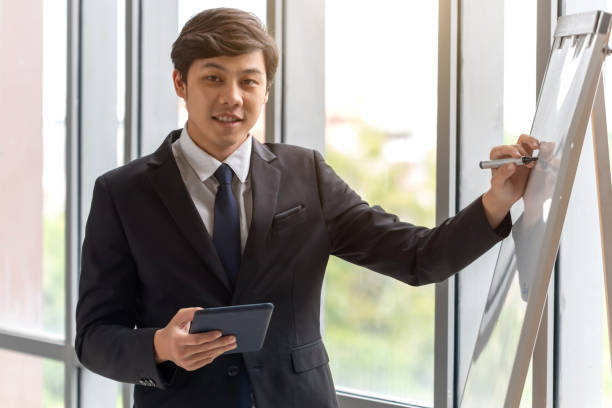 istock Business people are explaining work in the office 1172405032