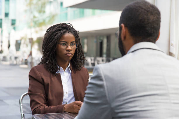 istock Customer consulting professional in outdoor cafe 1172407733