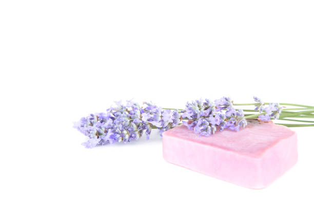 istock Lavender flowers with soap on white background 1172412603