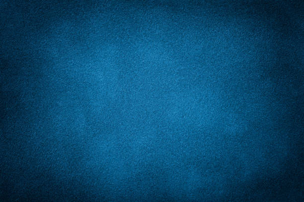 スエード生地のダークブルーマットの背景、クローズアップ。 - felt blue textured textile ストックフォトと画像