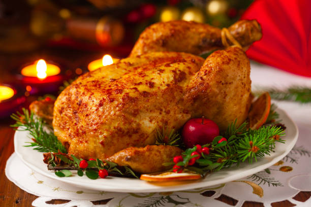 istock Roasted whole chicken with Christmas decoration. 1172413482