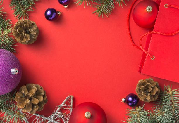 istock Christmas still life from christmas decorations on a red background overhead view 1172418256