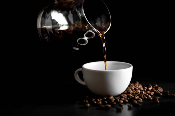 istock Coffee, black coffee, drip coffee, making coffee in low-light black 1172422459