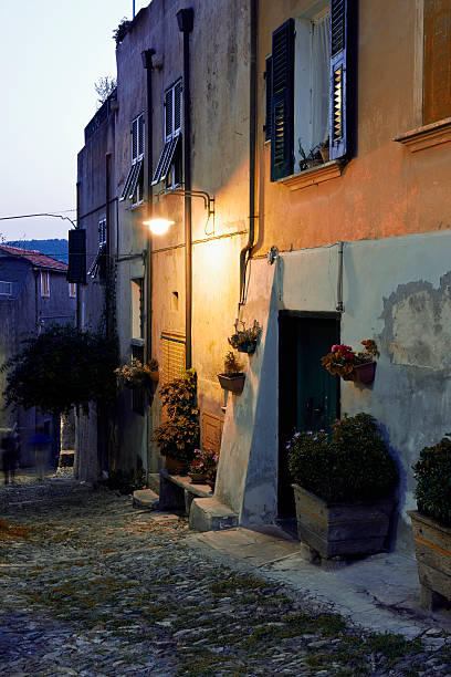 alley ligurian village looking out front door stock pictures, royalty-free photos & images