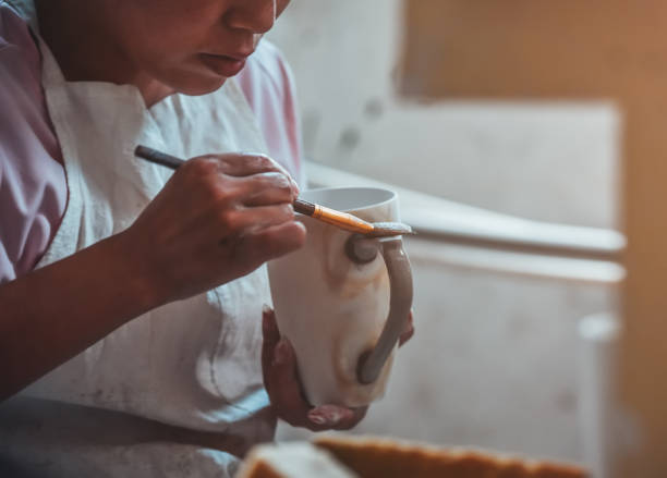 istock Glazing A Porcelain Cup in A Factory 1172422537