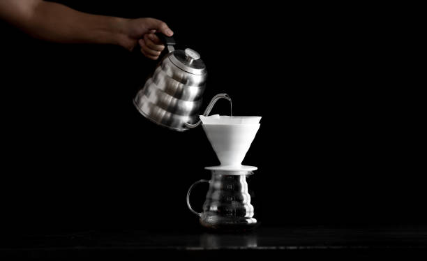 istock Coffee, black coffee, drip coffee, making coffee in low-light black 1172422553