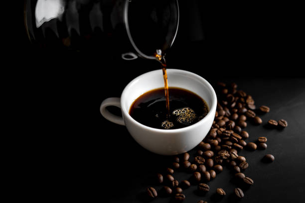istock Coffee, black coffee, drip coffee, making coffee in low-light black 1172422698