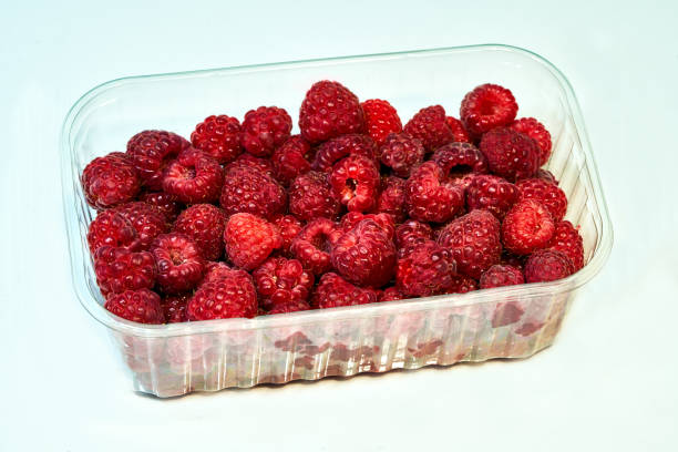 istock ripe raspberries lie on the table, fruits 1172426364