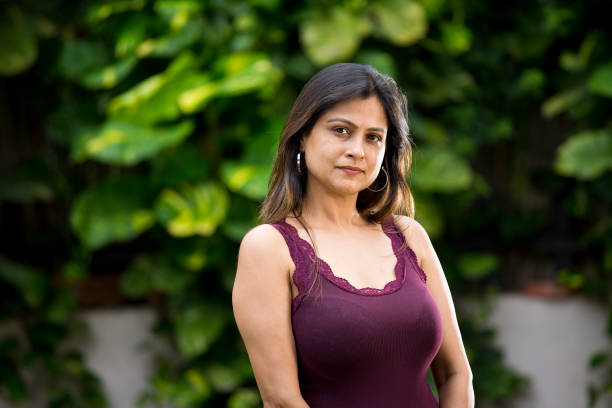 istock Beautiful woman looking at camera 1172426657