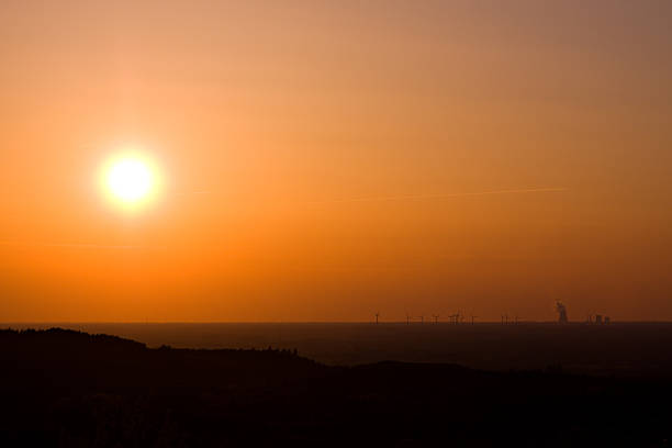 pôr do sol e geração de energia - ibbenbüren imagens e fotografias de stock