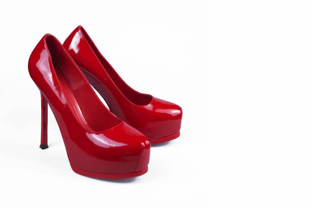 istock female red shoes on white background 1172432379