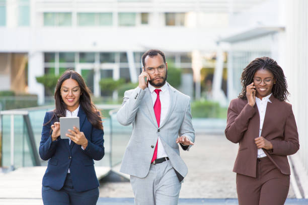istock Multiethnic business team with gadgets 1172432656