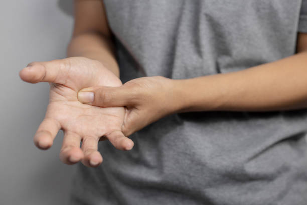 istock Woman suffering from pain in hand. 1172435569