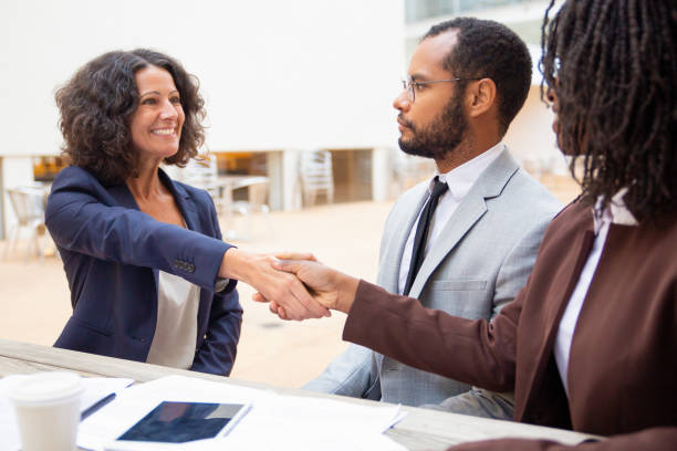 istock Applicant greeting HR manager at job interview 1172436716