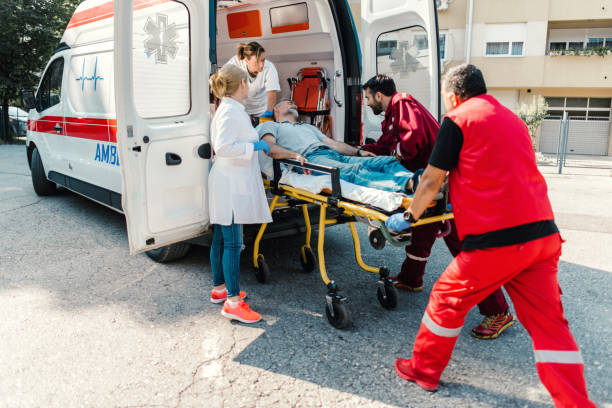 istock Paramedic team pushing stretcher 1172436874