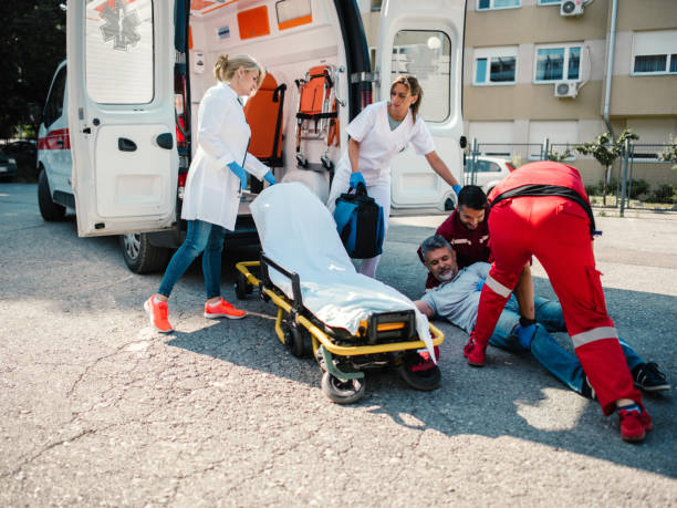 istock Paramedic Team Helping Injured man 1172439942