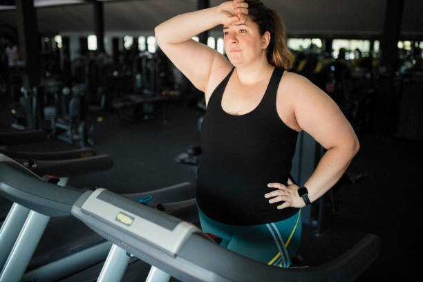 istock Overweight women at gym 1172440292