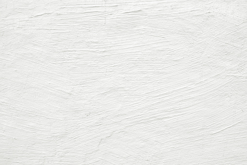 Close-up white painted grunge old wall texture background