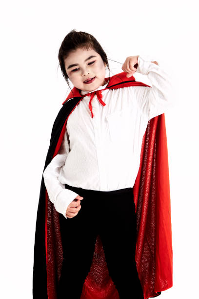 istock Happy Halloween Cute little Dracula on white background 1172448260