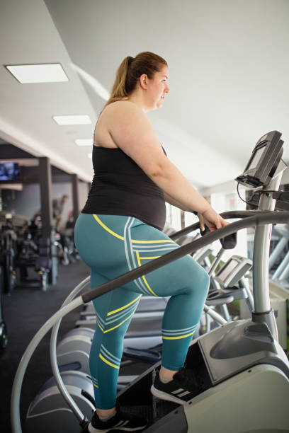 istock Overweight women at gym 1172448511