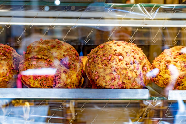 Bread with cranberry praline in Lyon bakery window.  this is a speciality bread of the Lyon Region in France.