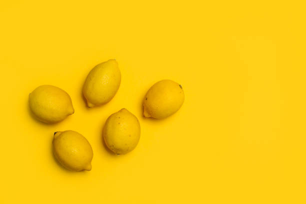 Lemons on a yellow background