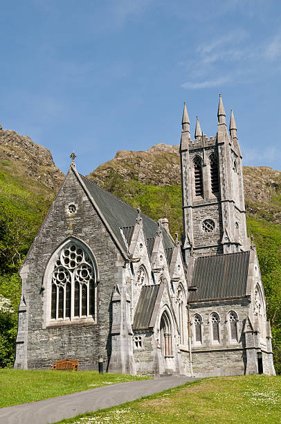 Kylemore Abbey Landscape Kylemore Abbey is the oldest of the Irish Benedictine Abbeys. The Community of nuns, who have resided here since 1920, have a long history stretching back almost three hundred and forty years. kylemore abbey stock pictures, royalty-free photos & images